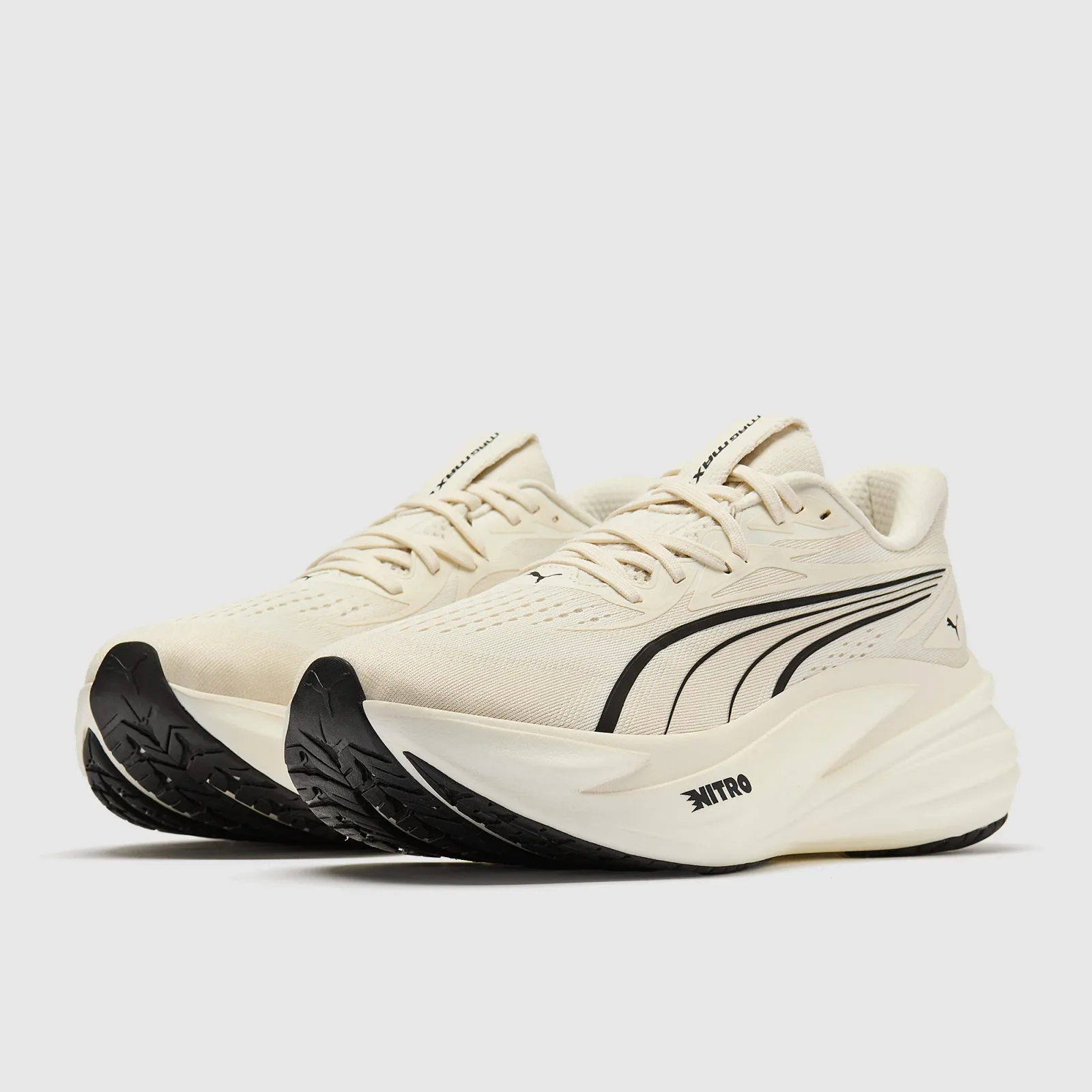 Warm White Puma Black